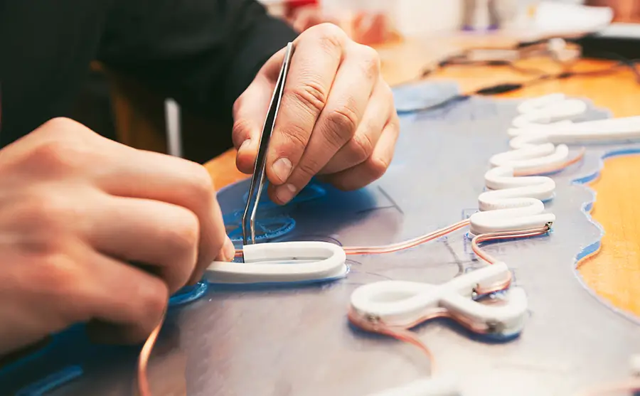 Technician working on custom store sign