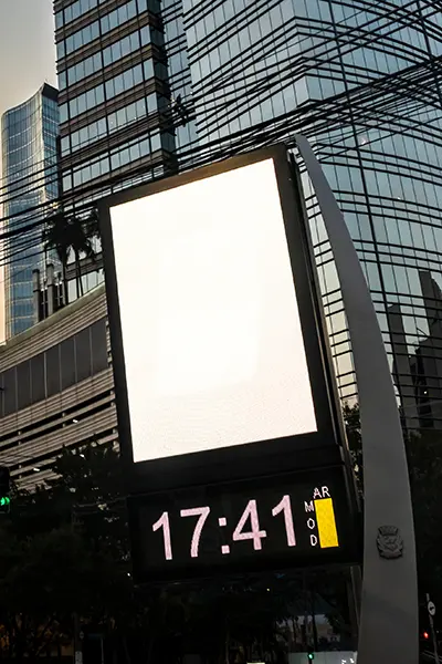 Outdoor electronic message center with digital clock display